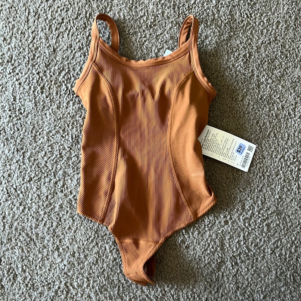 Brand new body suit with tags!